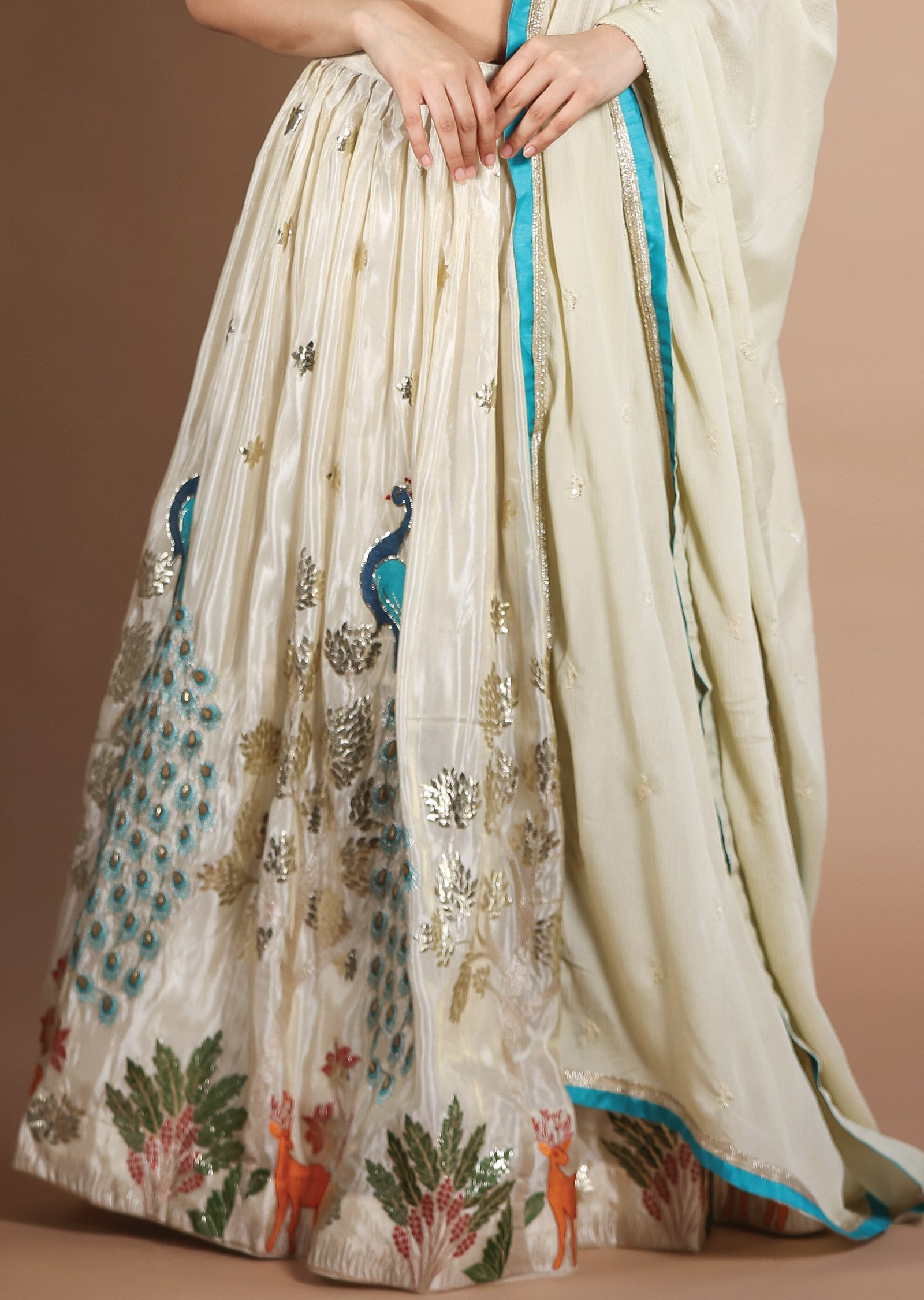 Beige Tissue Silk Lehengas