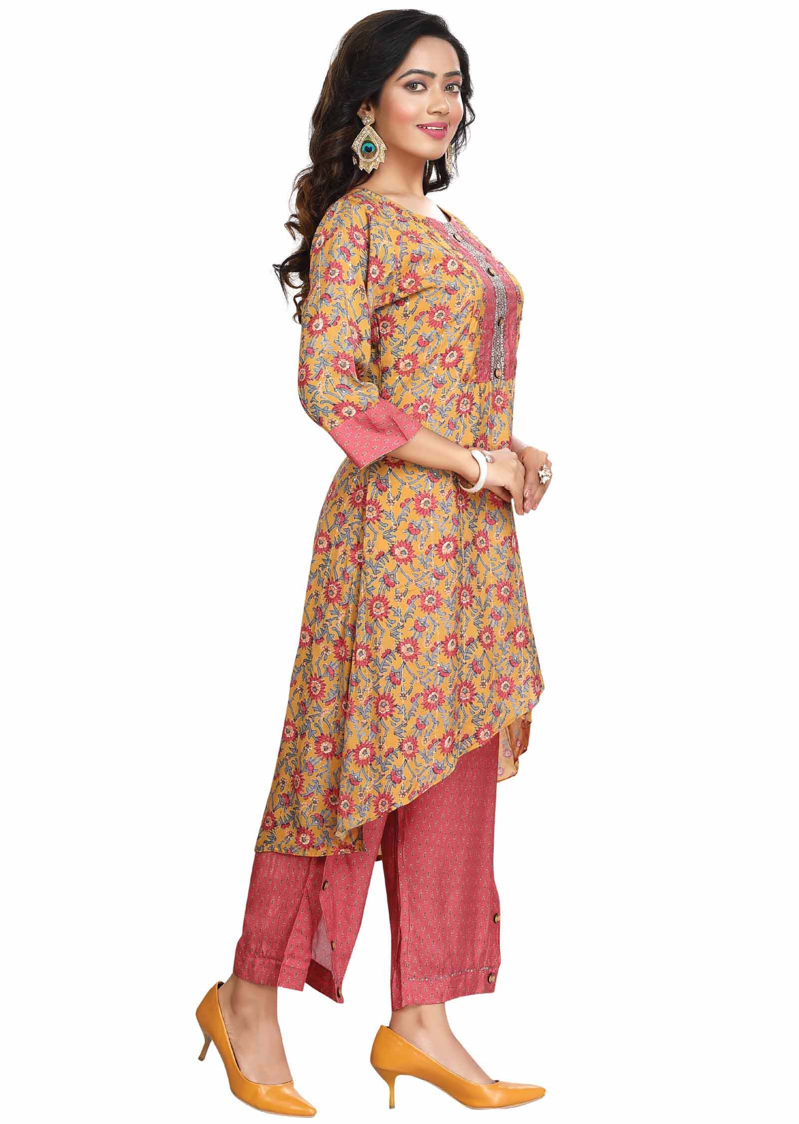 Yellow Muslin Sequins Kurti Sets